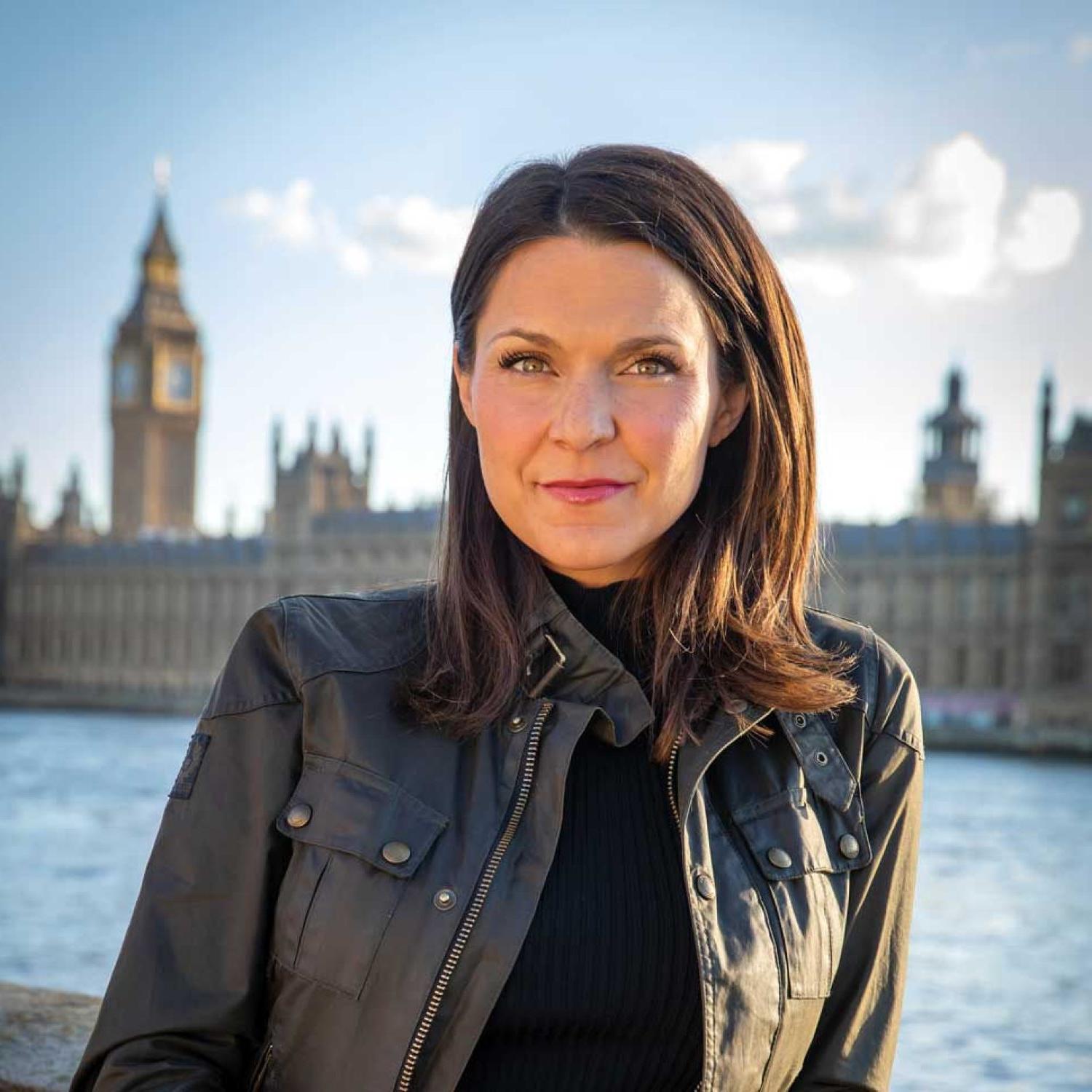 Maggie Rulli photographed in front of the Parliment buildings in London.